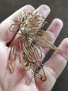 Mugler hair clip.