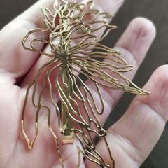 Mugler hair clip.