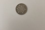 English six pence 1930