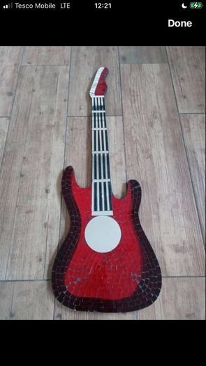 Mosaic decorated wooden base guitar