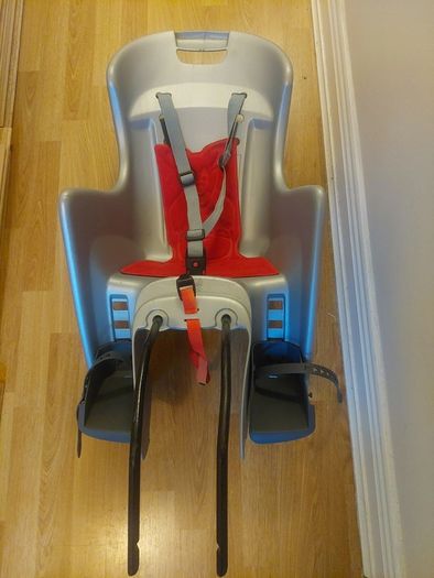 Bycycle child seat carrier