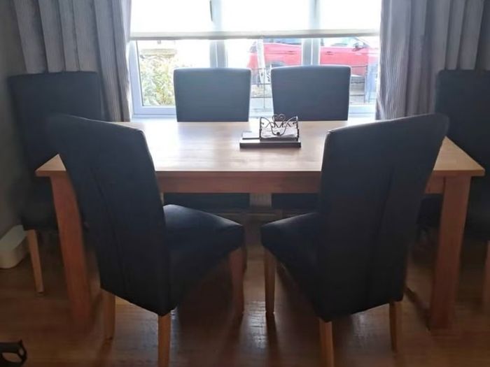 Oak dining table and chairs