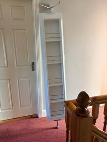 Rotating bathroom mirror cabinet