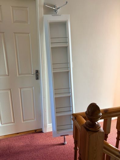 Rotating bathroom mirror cabinet