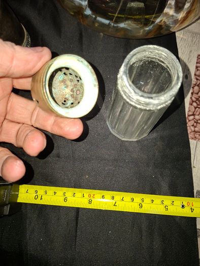 Antique Glass Sugar or Spice Shaker featuring a perforated Silver Plated Lid.