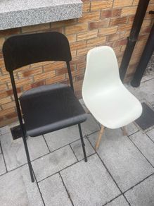 Two white chairs and one bar stool