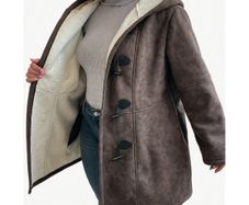 BNWT Lovely Coat with a Hood & Soft Fur on the inside size 20