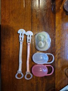 Soothers, clips and storage cases