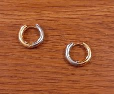 Pretty gold/silver loop earrings (fashion jewellery)