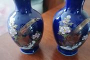 two small blue vases