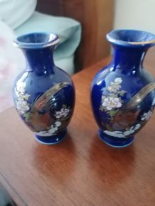 two small blue vases