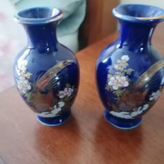 two small blue vases