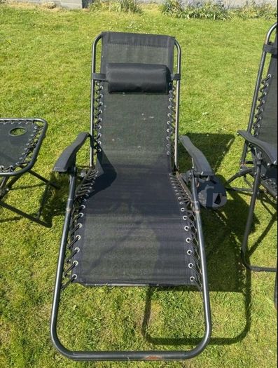 2 black recliner garden chairs