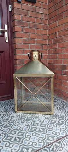 Large brass lantern with strap handle