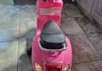 Pink girl's motorbike
