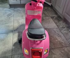 Pink girl's motorbike