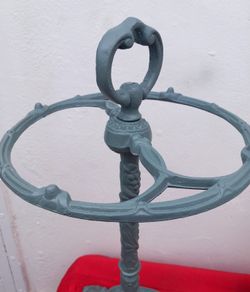 Cast iron umbrella/stick stand.
