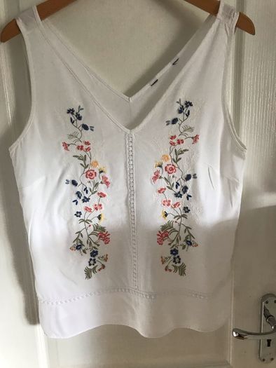 Ladies white double v embroidered top