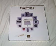 Brand new presenttime clock  photo frame holds 12 photos