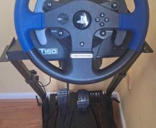 Gaming wheel, pedals, and stand