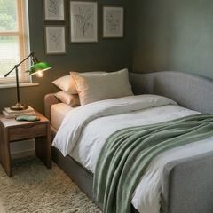 Light grey  upholstered daybed with under-bed storage drawer