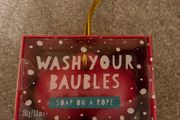 festive "Wash Your Baubles" soap on a rope