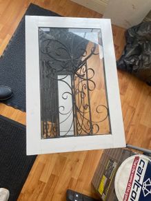 Wrought iron and glass side table