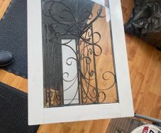 Wrought iron and glass side table