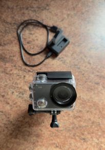 Action Camera with DJI helmet clamp