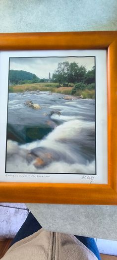 Framed Photograph art print depicting a rushing stream or waterfall, labeled -Glendalough - Co Wicklow- and hand-signed by the artist by Michael Walsh.