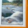 Framed Photograph art print depicting a rushing stream or waterfall, labeled -Glendalough - Co Wicklow- and hand-signed by the artist by Michael Walsh. Image 2