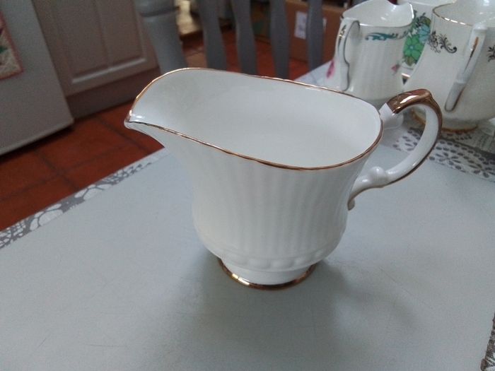 Four Good China Milk Jugs