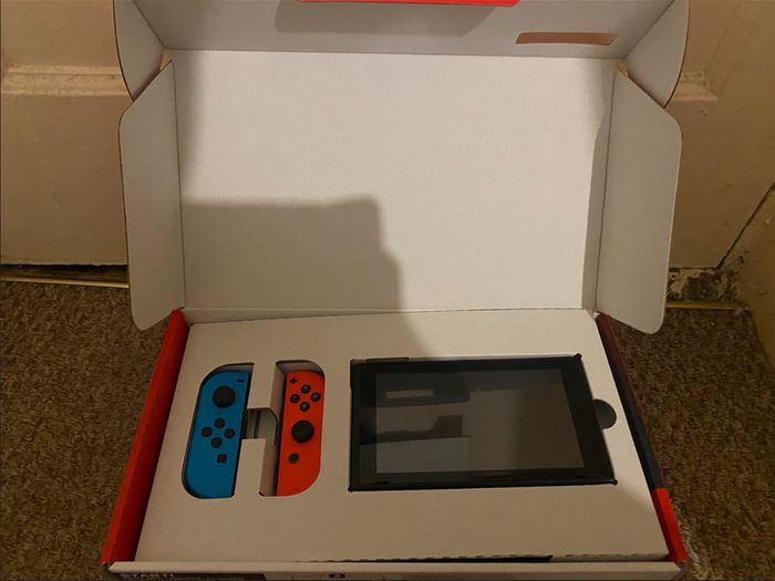 Nintendo Switch 32GB, Neon Red & Blue + 4 Games