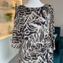 Wallis Ladies Knee-length Black and Beige Animal-print Dress with gathered side tie. Image 7