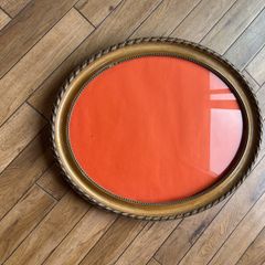 Antique Oval Gold picture frame with decorative rope & twist moulding