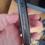 Sony Ericsson W200i , with charger and speakers. Image 6