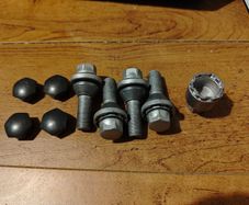 Volvo lock nuts with plastic caps