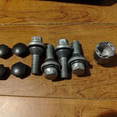 Volvo lock nuts with plastic caps