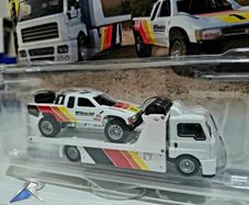Hotwheels Toyota Off Road Truck with Fleet Street transporter.