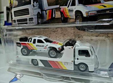 Hotwheels Toyota Off Road Truck with Fleet Street transporter.