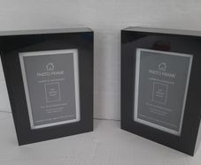 2 new wooden photo frames in wrapping