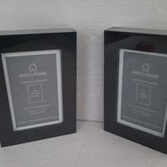 2 new wooden photo frames in wrapping