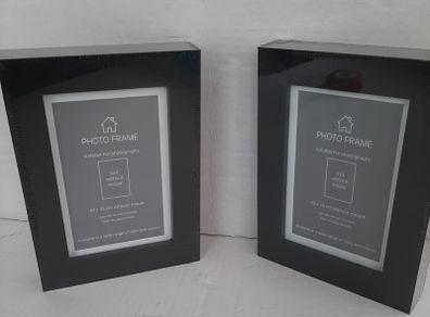 2 new wooden photo frames in wrapping