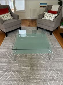 Glass coffee table, like new.