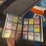 pokemon cards and book and sleeves and game thing Image 3