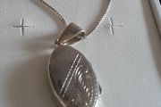 silver chain and locket
