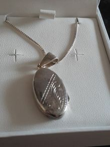 silver chain and locket