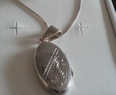 silver chain and locket