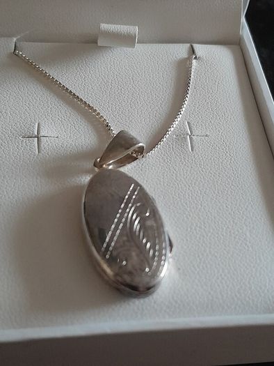 silver chain and locket