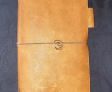 Handmade leather personal size notebook passport diary holder 17cm x 11cm with 4 elastics to hold your notebooks diaries etc and also a pen loop and a handmade notebook also FREE STANDARD POSTAGE INCLUDED